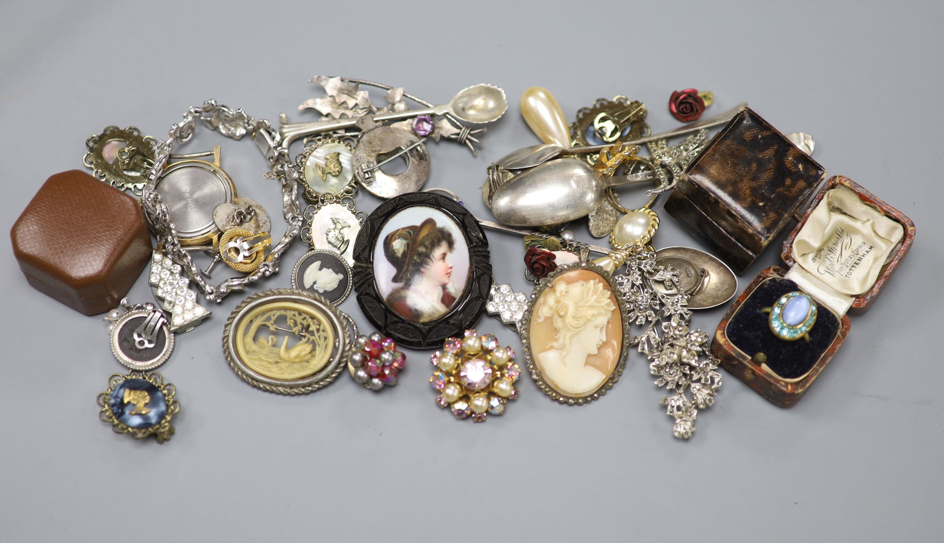 A small group of assorted costume jewellery and other items including silver teaspoons and Timex wrist watch.